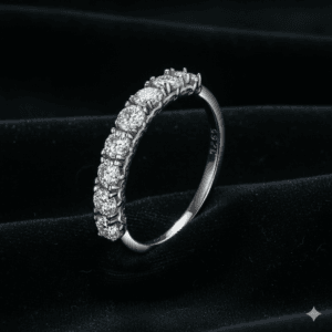Celeste half-eternity band in 925 sterling silver, set with a row of matched round lab-created stones